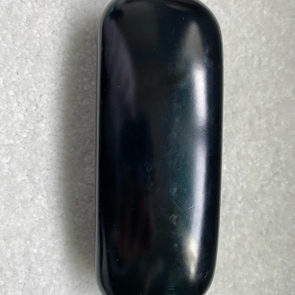 Authentic Gucci Glasses case- black- with embossed “GUCCI” on front/top